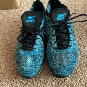 Sz 8.5 Nike flyknit racer “blue volt”